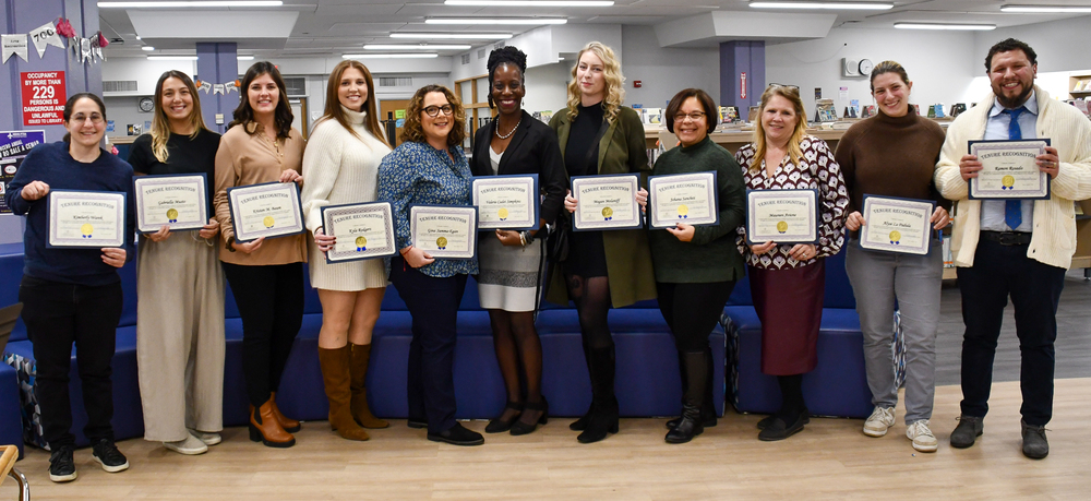 Teachers who earned tenure holding their certificates