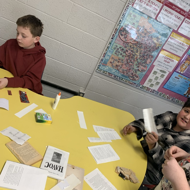 Fifth grade making bookmarks out of old books for reading month!