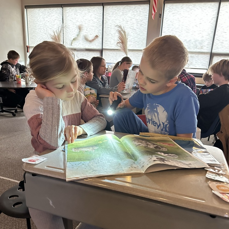 Miss Jenssen’s class joined Mrs. Johnson’s class this morning for flash light buddy reading.