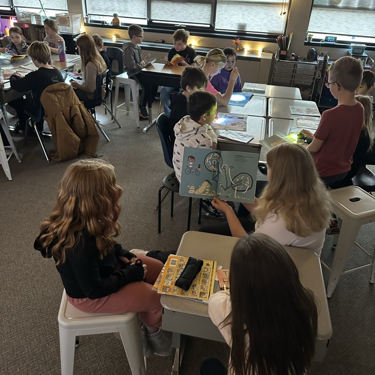 Miss Jenssen’s class joined Mrs. Johnson’s class this morning for flash light buddy reading.