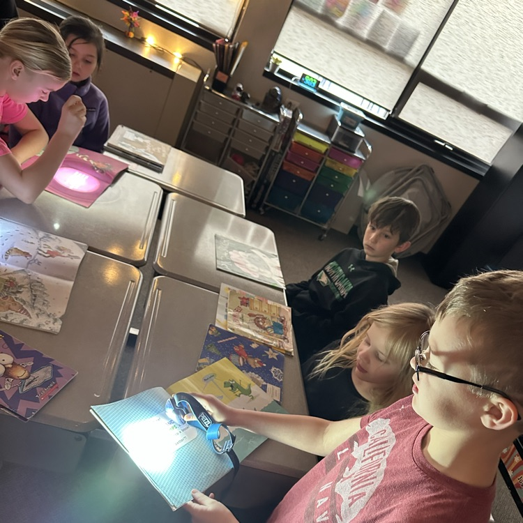 Miss Jenssen’s class joined Mrs. Johnson’s class this morning for flash light buddy reading.