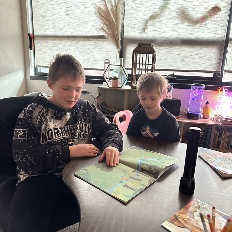 Miss Jenssen’s class joined Mrs. Johnson’s class this morning for flash light buddy reading.