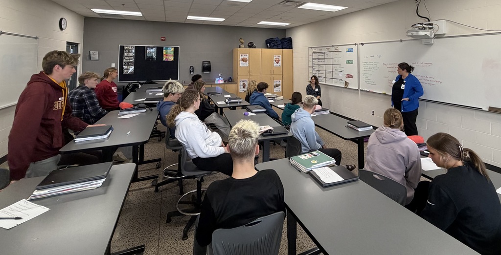 Shannon Barie (DPT) and Trista Raymond (DPT), Physical Therapists from New Ulm Medical Center, speaking to a classroom of HS students.