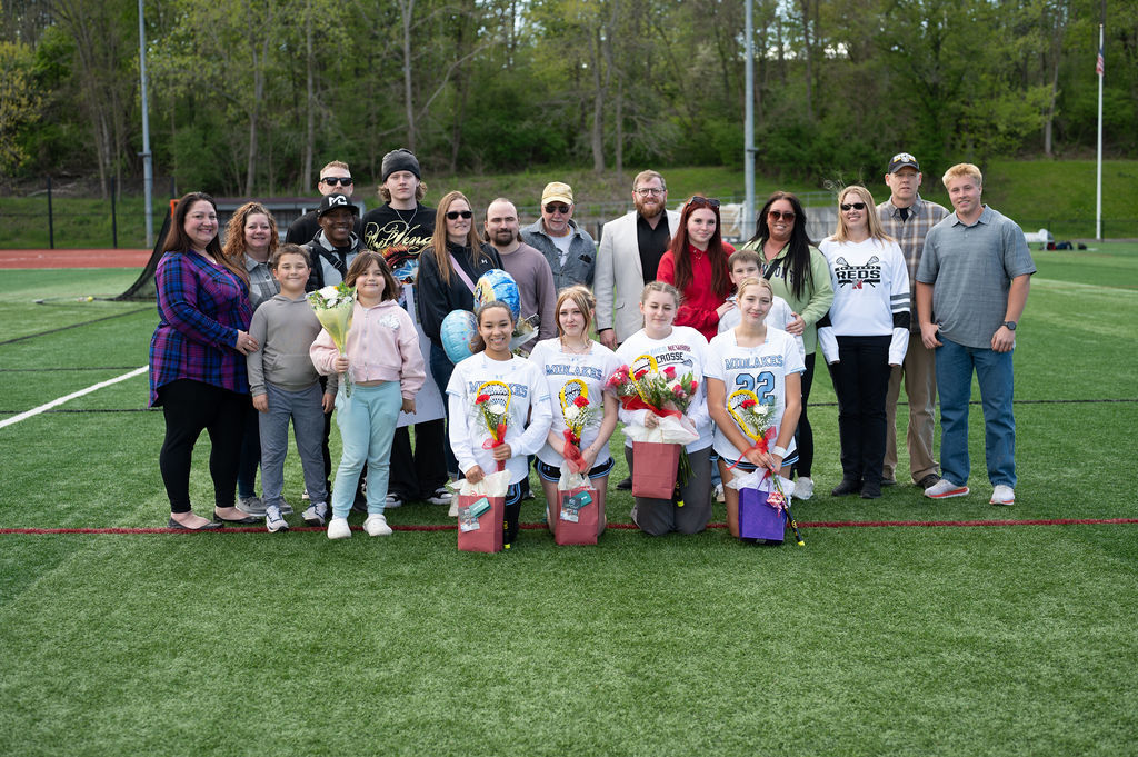 Pictured: Varsity girls lacrosse players and their families