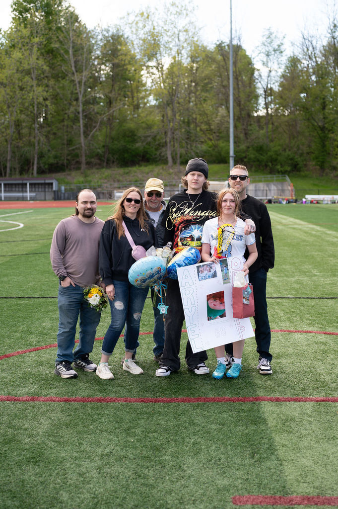 Pictured: Varsity girls lacrosse player and their family