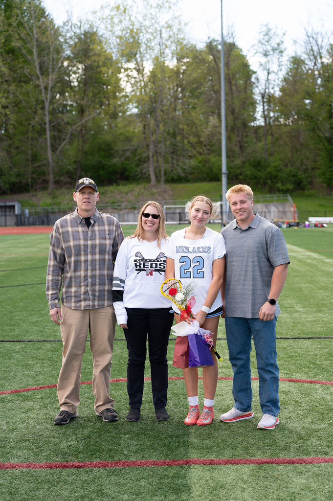 Pictured: Varsity girls lacrosse player and their family