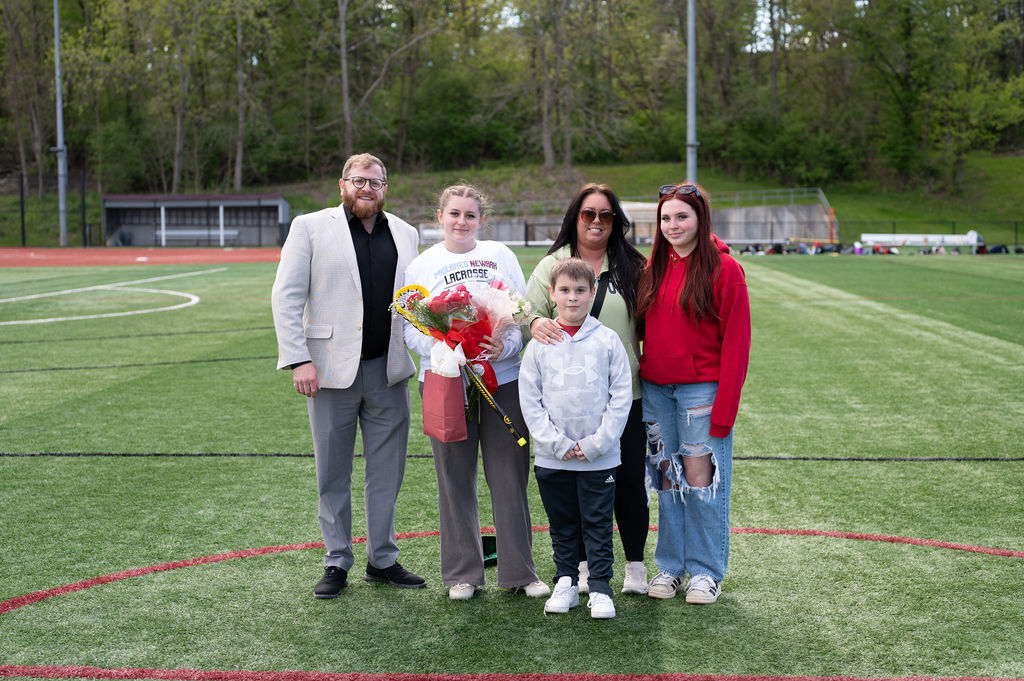 Pictured: Varsity girls lacrosse player and their family