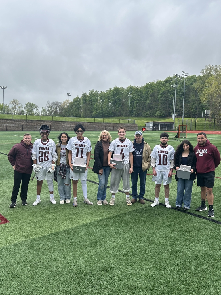 Pictured: Varsity Boys lacrosse player with their family