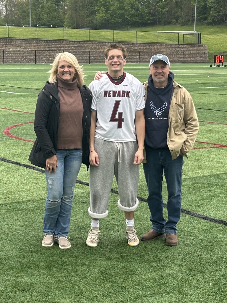 Pictured: Varsity Boys lacrosse player with their family