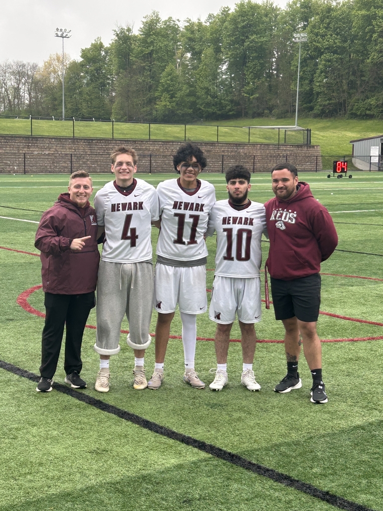 Pictured: Varsity Boys lacrosse player with their family
