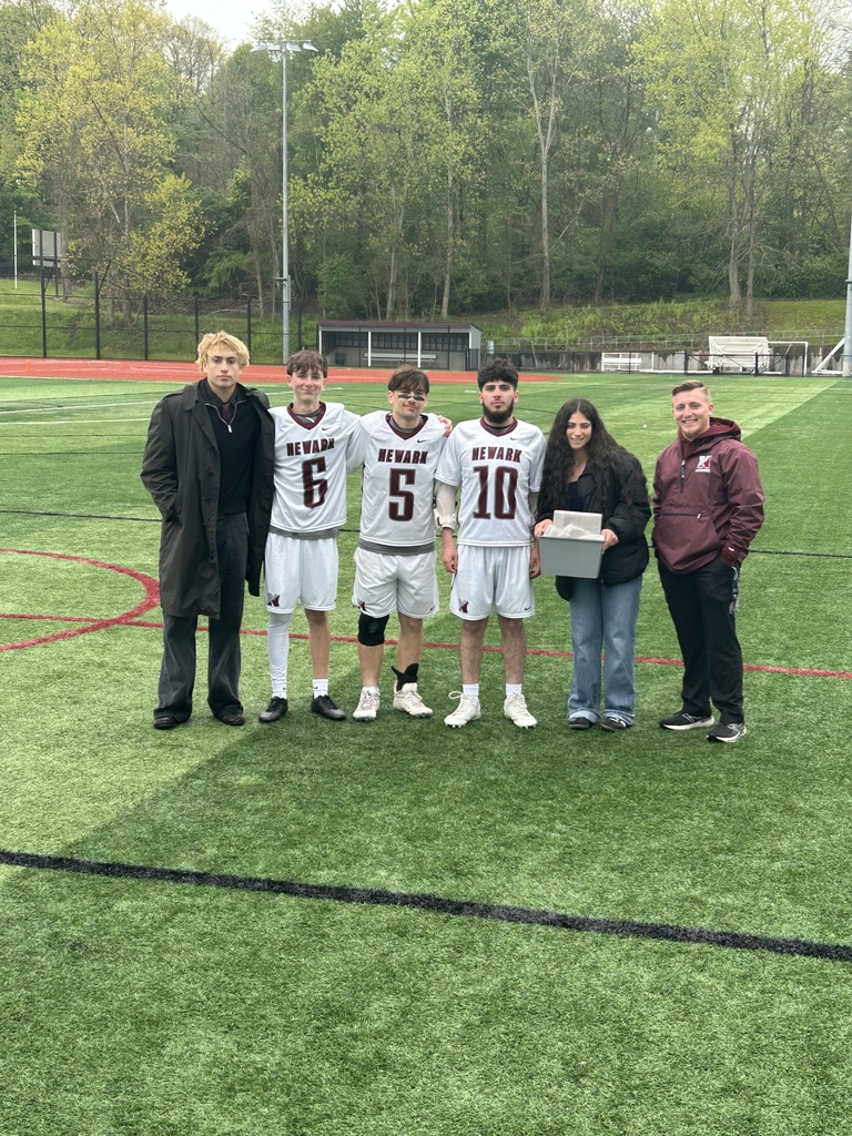Pictured: Varsity Boys lacrosse player with their family