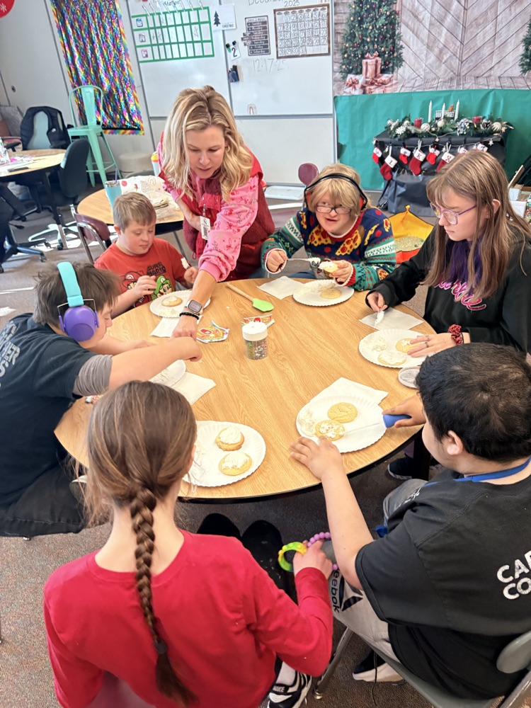 Practicing knife/spreading skills with Miss Katie.