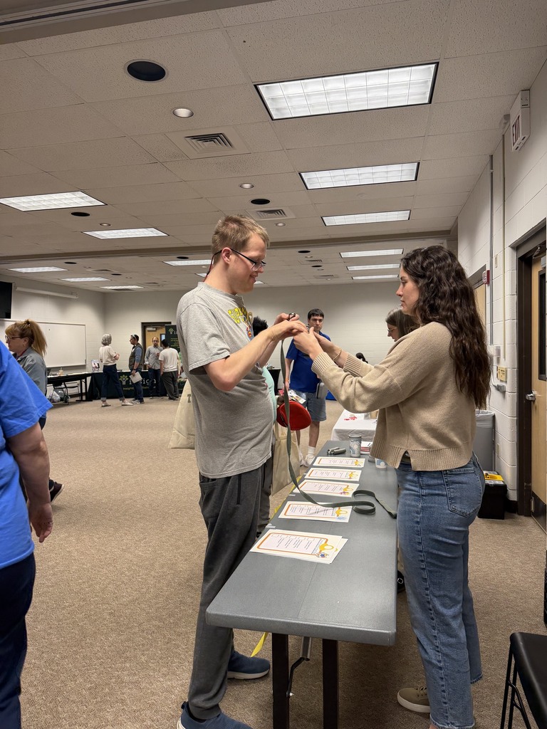 Transition Fair student interacting at a table