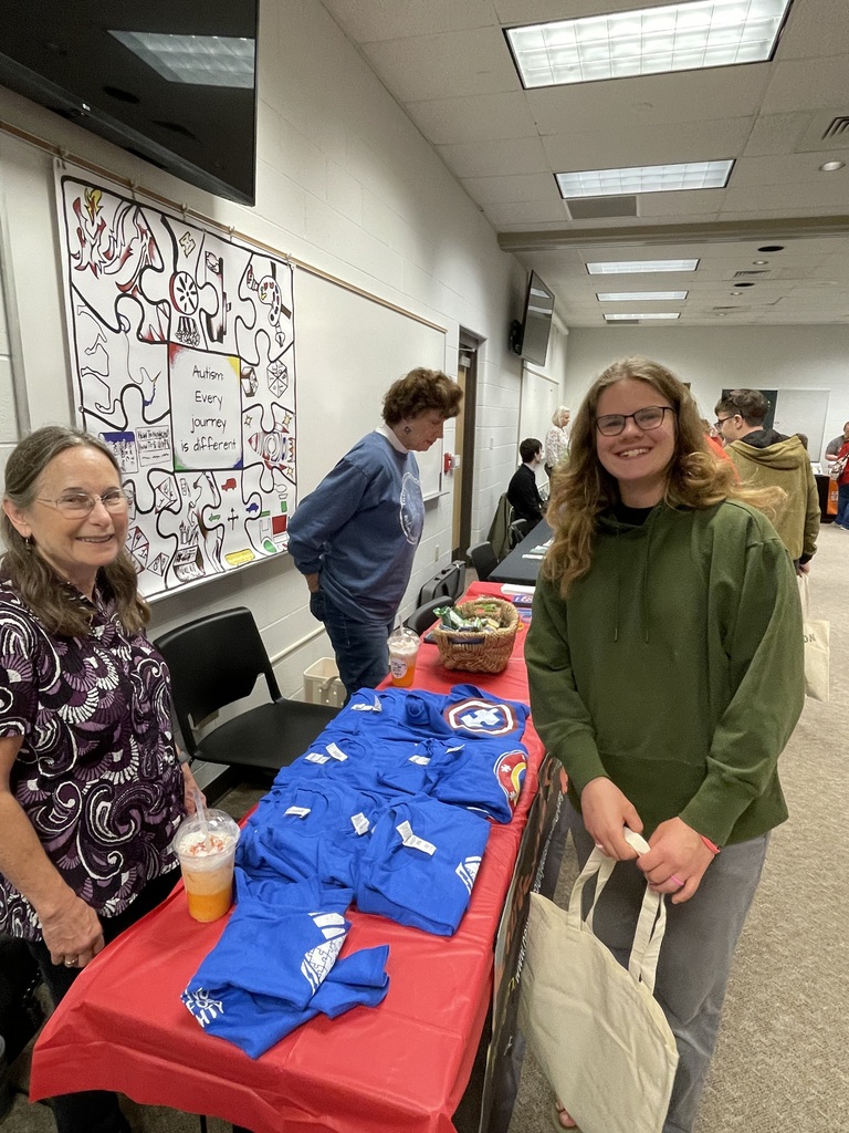 Transition Fair student standing at a table