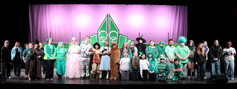 The cast and crew of “The Wizard of Oz” gather on stage as they prepare for a rehearsal on March 12th, 2026.