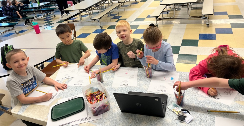 Newfield Elementary students in cafeteria working on Farm to School activities