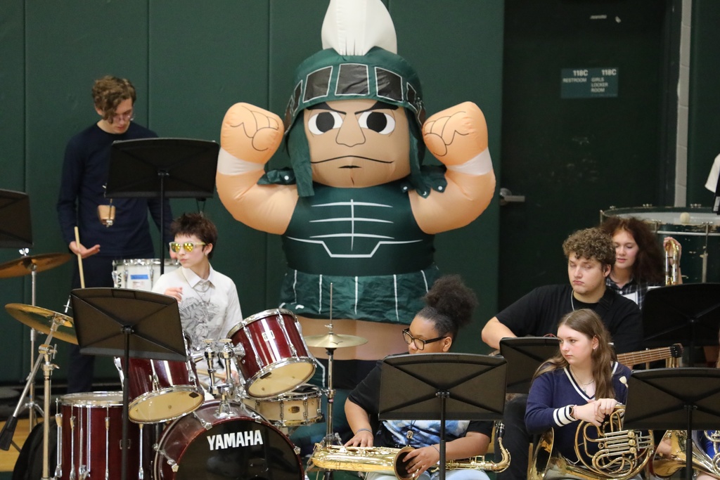 Some students in the band with the Trojan
