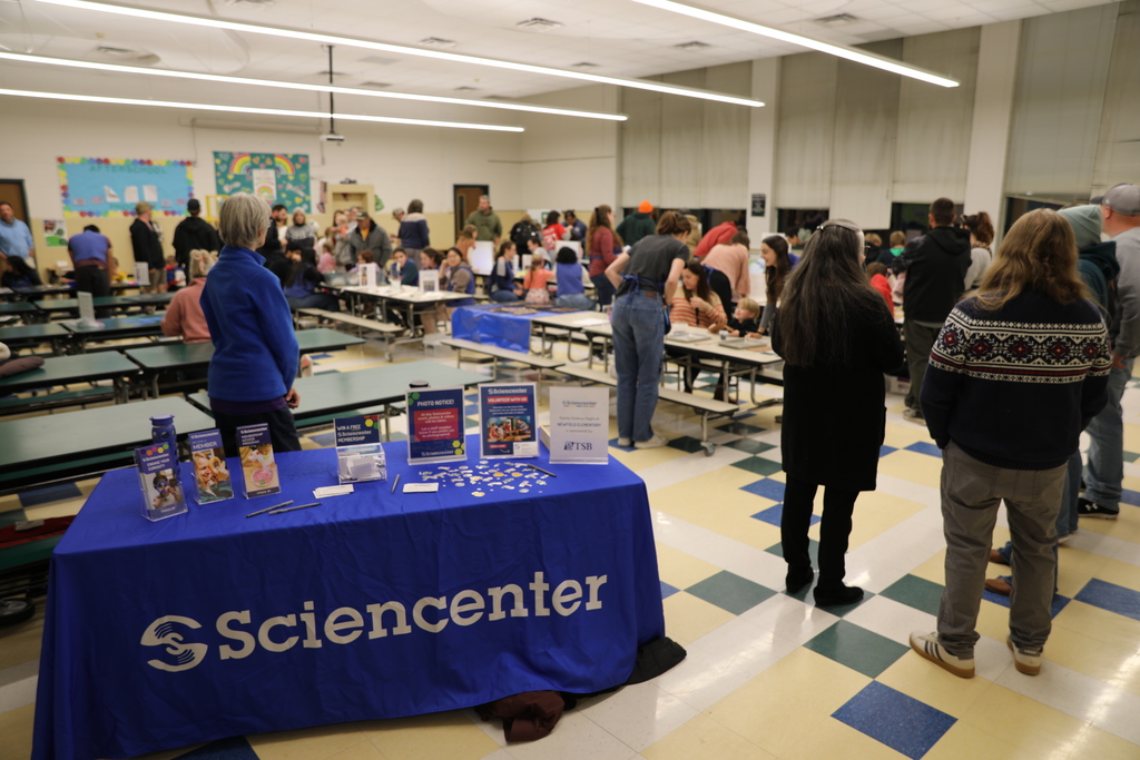 A picture of the full room and everyone in it