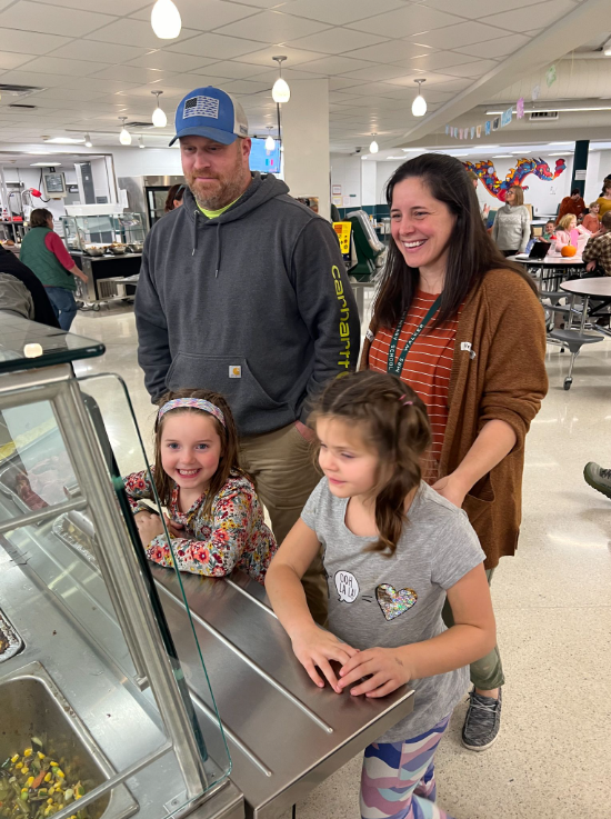 family at annual harvest dinner