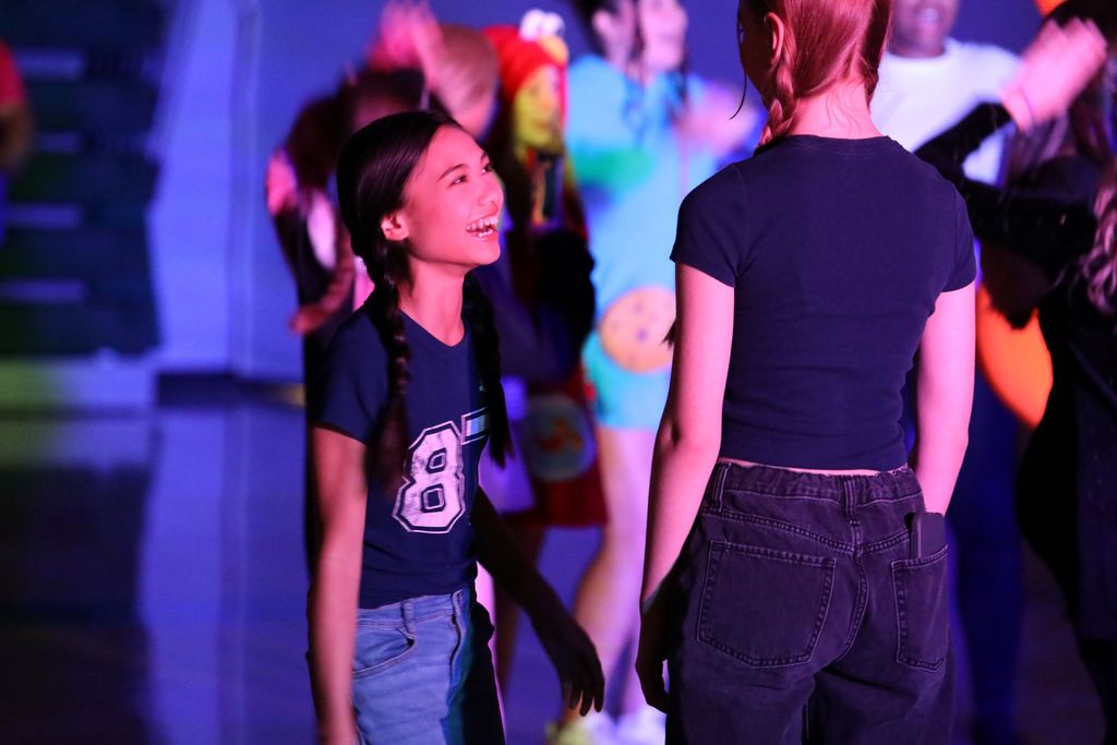 a student smiling at the dance