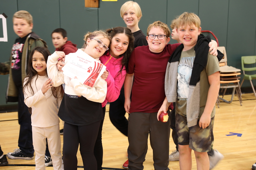 six students posing for the camera and smiling