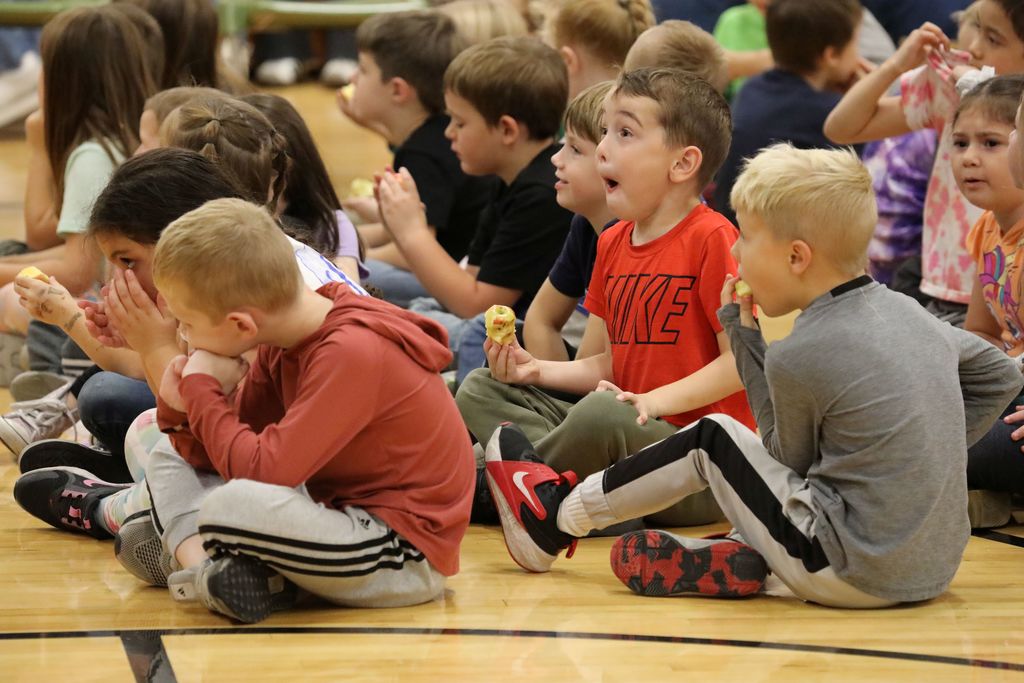 Students reacting to what is being announced 