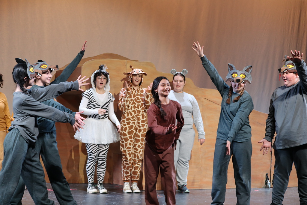 A group of students bowing