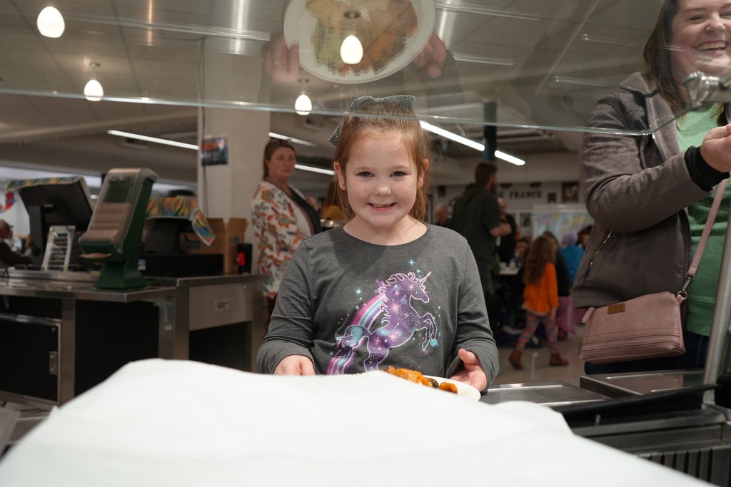 Student in line at 2nd annual harvest dinner