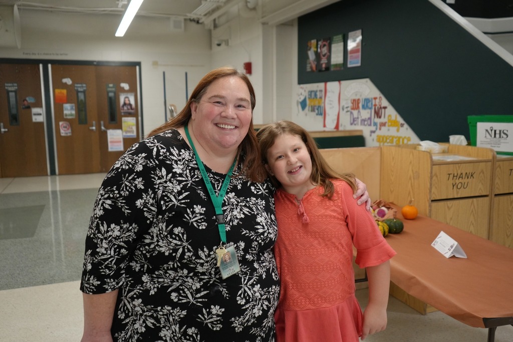 Teacher and student volunteering at the 2nd annual harvest dinner