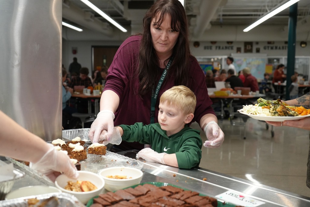 Student serving at the 2nd annual harvest dinner