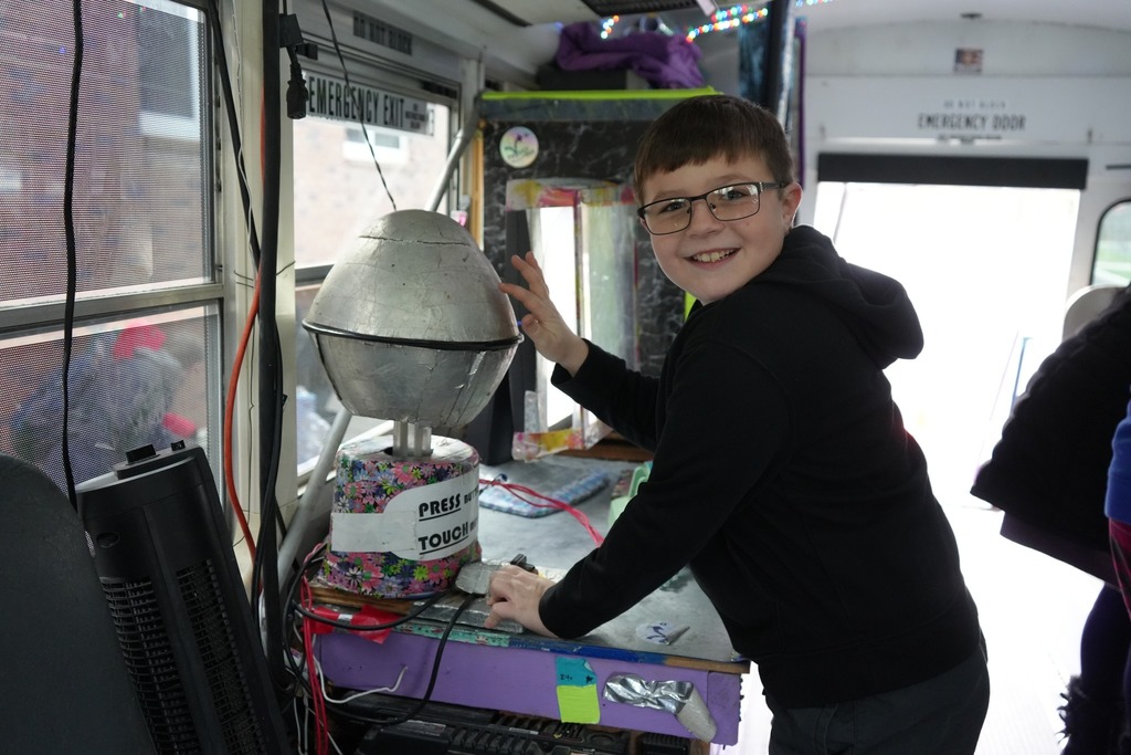 Student touching the experimental device