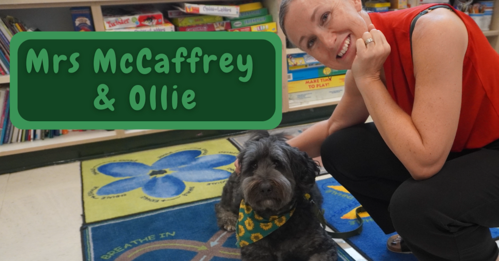 Mrs. McCaffrey and Ollie posing for camera