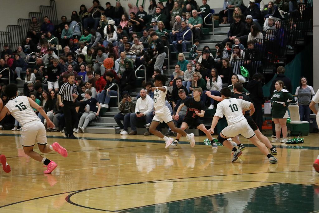 the team scrambling midgame for the ball