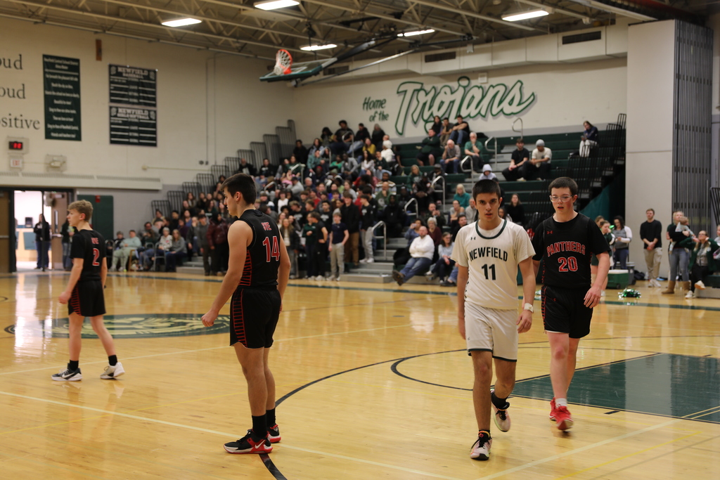 the team walking off court