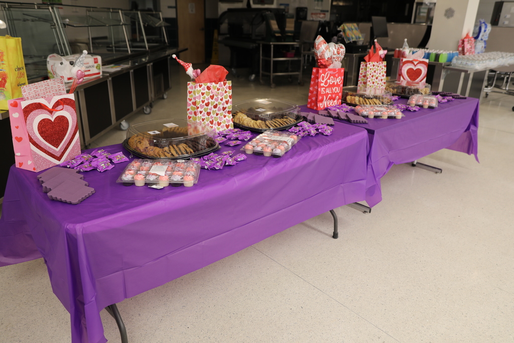 the tables set up with cookies and snacks for after the concert