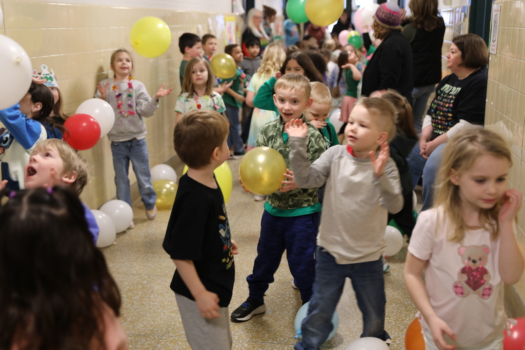 kids playing with balloons