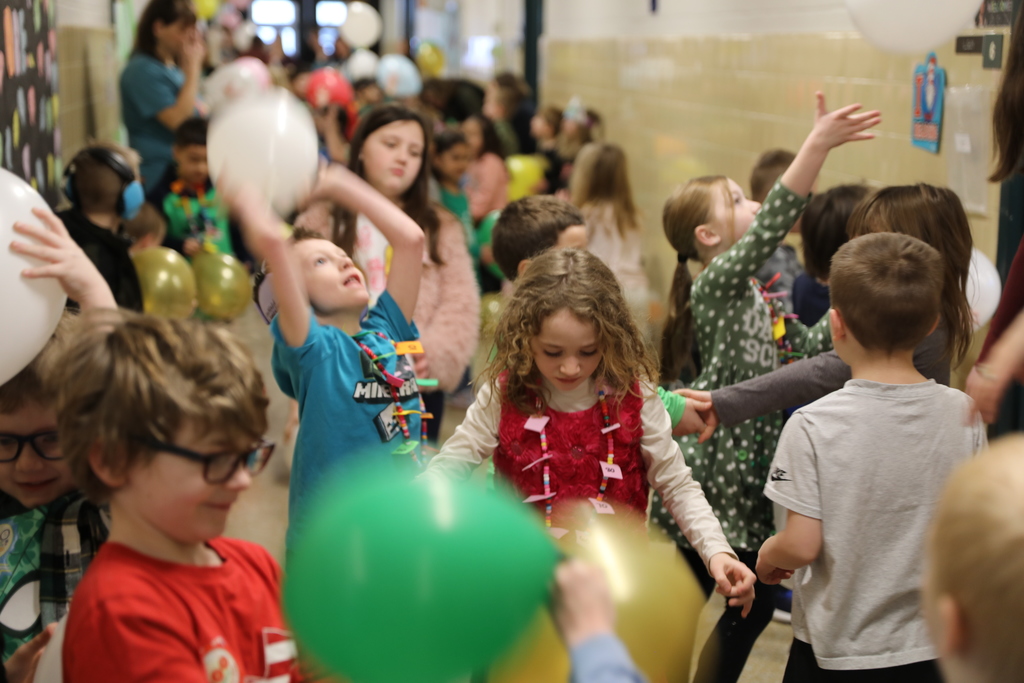 kids playing with balloons