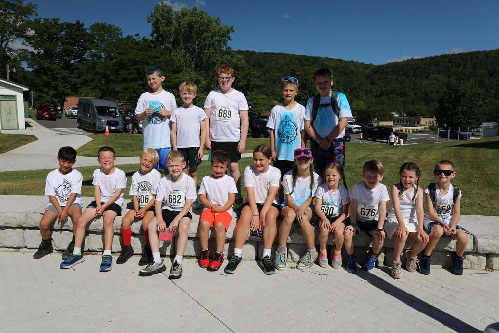 a group of young students posing for the camera before the color run