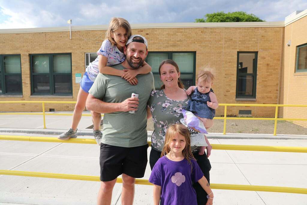 a family posing for the camera