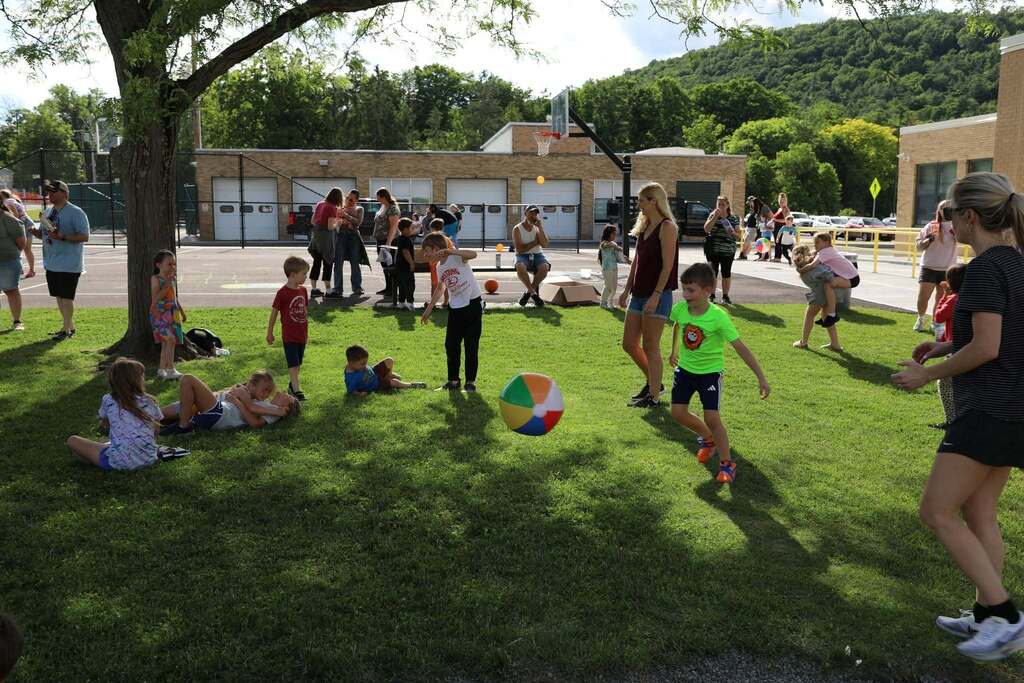 a wide shot of the family field night