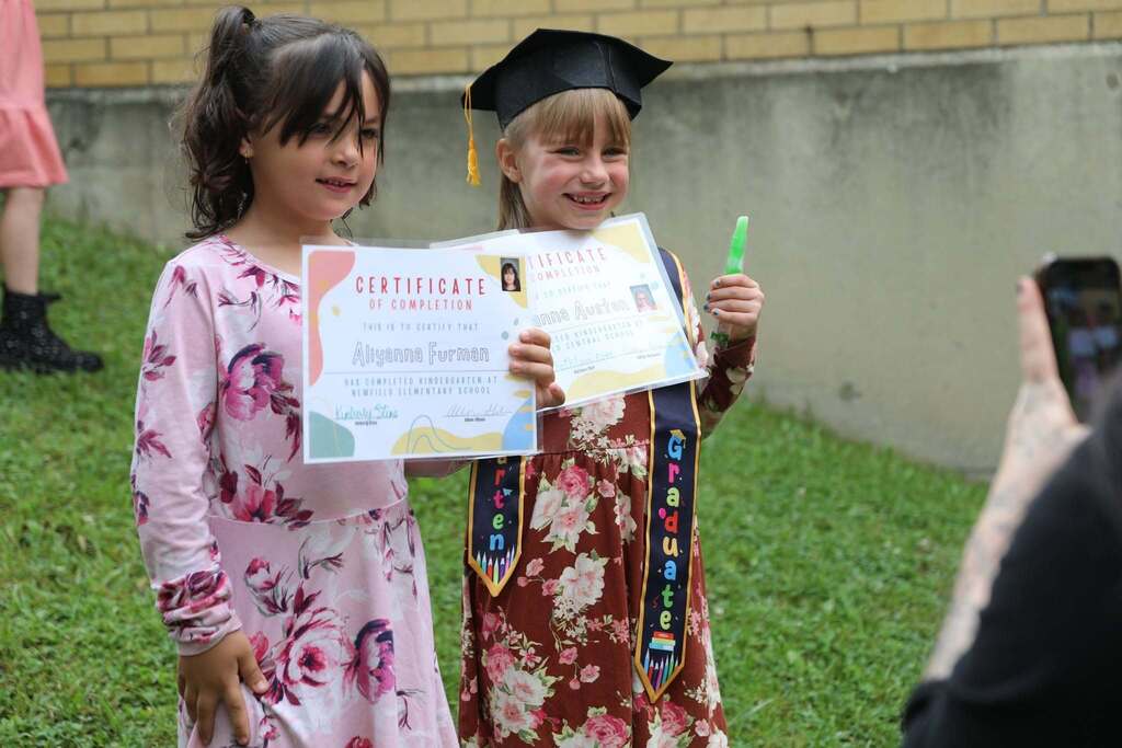 two students posing for the camera