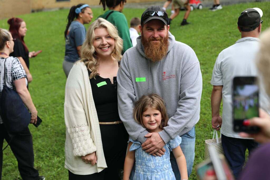 a family posing for the camera