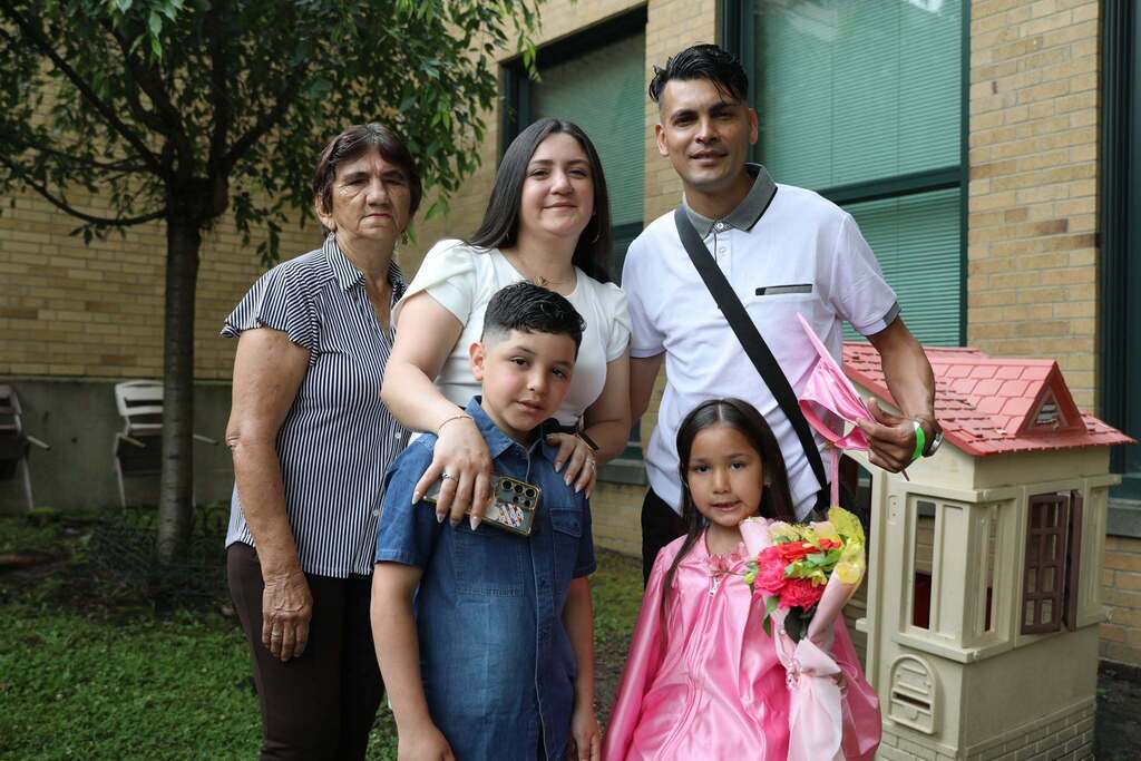 a family posing for the camera