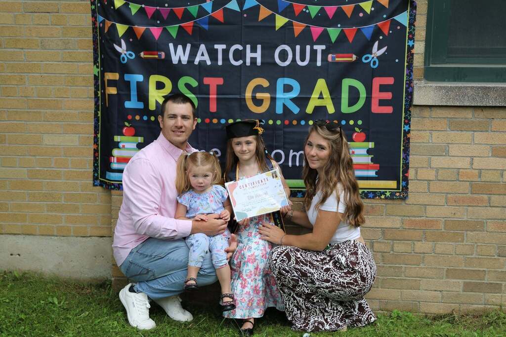 a family posing for the camera