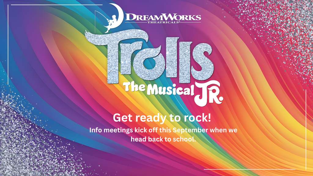 Promotional poster for Trolls The Musical Jr.. A vibrant rainbow swirl background fills the image, framed by thin white lines and silver glitter accents in the corners. At the top is the DreamWorks Theatricals logo featuring a child fishing from a crescent moon. Large glittery silver text in the center reads “Trolls,” with “The Musical Jr.” below in white. Beneath the title, bold white text says, “Get ready to rock!” Smaller text at the bottom reads, “Info meetings kick off this September when we head back to school.