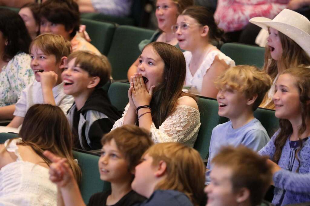 a student reacting in the crowd