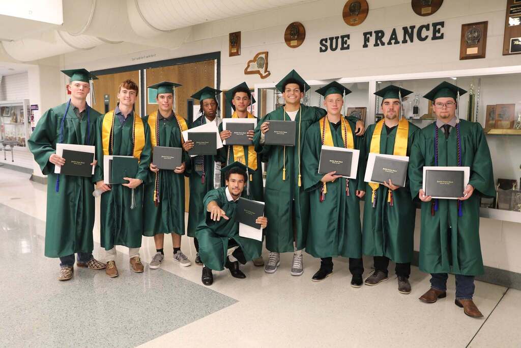 a group of students all posing together for camera