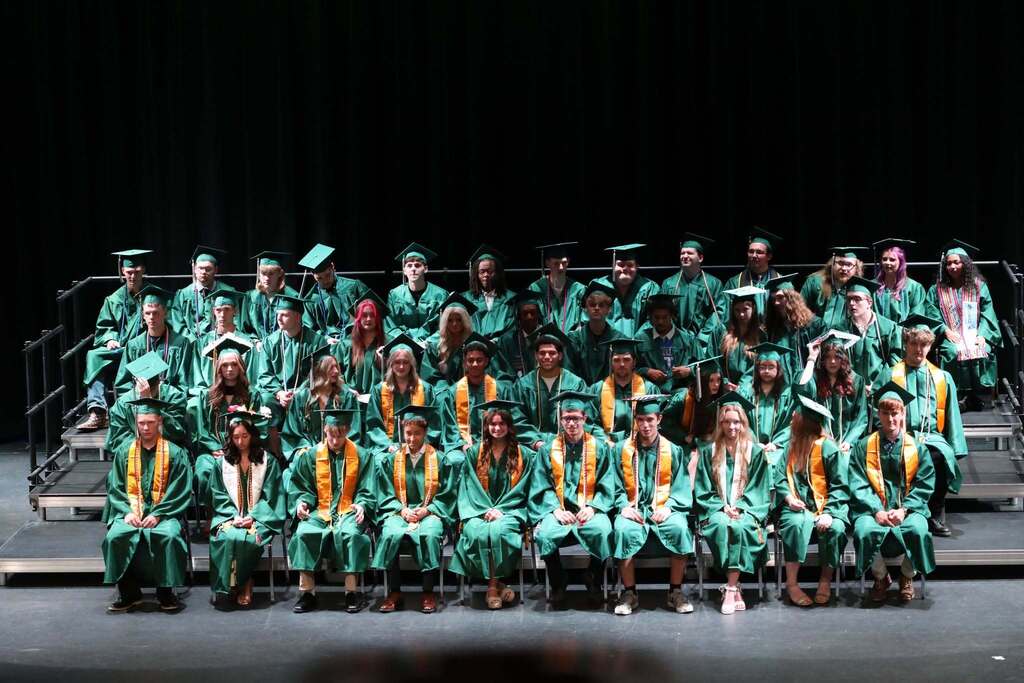 all the graduates on stage together