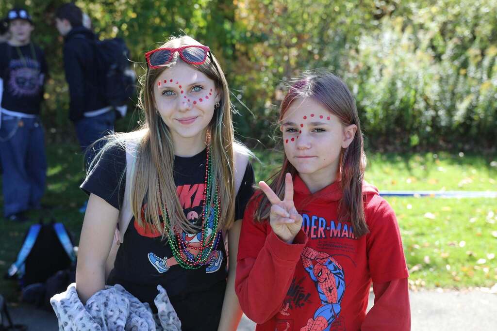 two students smiling at camera