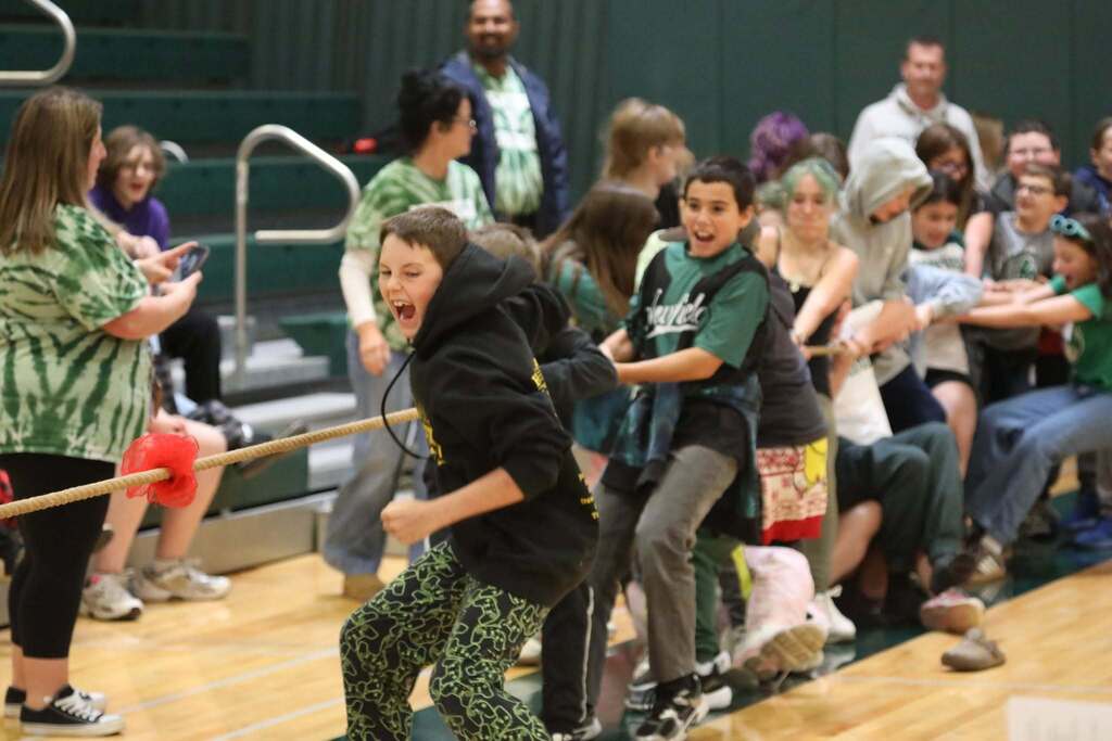 students playing tug of war